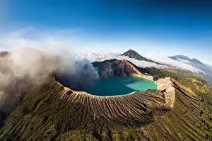 Aerial panorama drone view of mount Kawah Ijen volcano crater at sunrise, East Java, Indonesia