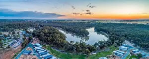 Caravan Park Prints: Aerial panorama of holiday park cabins on the shores of Murray RIver in Moama