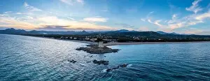 Nightfall Prints: An aerial panorama landscape of the Torre di Barisardo beach on the east coast of Sardinia at dusk