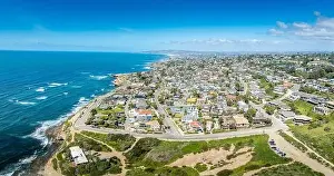Ocean Beach Prints: Aerial panorama of Sunset Beach in San Diego with ragged California ocean coastline