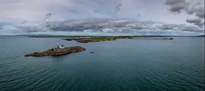 Aerial panorama view of the historic Fenit Lighthouse on Little Samphire Island in Tralee Bay