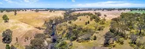 Travel Locations Prints: Aerial panorama of Wannon River and Australian countryside on hot summer day