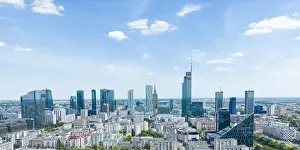 Aerial panorama of Warsaw, Poland over the Vistual river and City center in a distance
