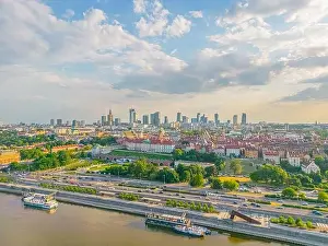 Aerial panorama of Warsaw, Poland over the Vistual river and City center in a distance Old town