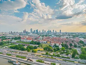 Aerial panorama of Warsaw, Poland over the Vistual river and City center in a distance Old town