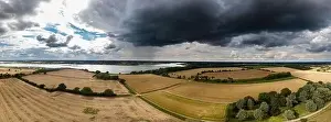 River Deben Prints: Aerial panoramic of the British countryside with a thunderstorm rolling in