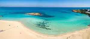 Off Season Prints: Aerial panoramic coastal view of Fig Tree Beach - a popular tourist attraction in Ayia Napa