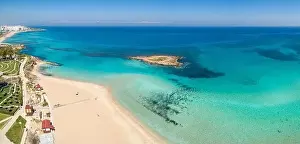 Off Season Prints: Aerial panoramic coastal view of Fig Tree Beach - a popular tourist attraction in Ayia Napa