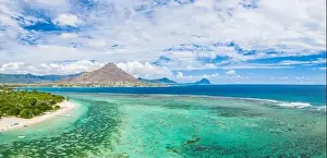 Flic En Flac Prints: Aerial panoramic by drone of Flic en Flac beach with Tamaris village and Le Morne mountain