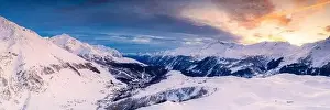 Valtellina Prints: Aerial panoramic by drone of Madesimo and Andossi during a winter sunset