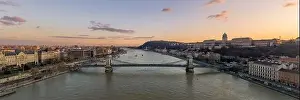 National Gallery Prints: Aerial Panoramic drone shot of chain bridge over Danube river during Budapest sunset time
