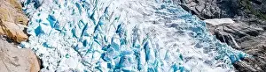 Aerial panoramic of ice blocks of Briksdalsbreen glacier