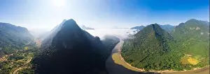 Luang Prabang Prints: Aerial panoramic Nam Ou River drone flying over morning fog mist and clouds