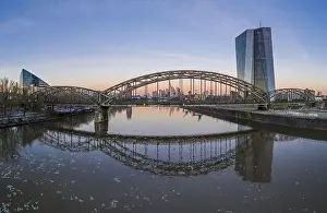 Business District Prints: Aerial panoramic picture of Deutschherrnbrücke with Frankfurt skyline during sunrise in winter