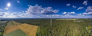 Environment Protection Prints: Aerial panoramic picture of a high voltage power line in forest area in Germany