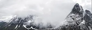 Mountain Ridge Prints: Aerial panoramic of Romsdalshornet mountain in a sea of clouds