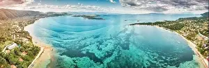 Vourvourou Prints: Aerial panoramic scenic view of azure blue lagoon and paradise bay with majestic patterns on a sea shelf