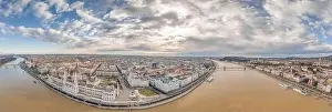 Morning Glow Prints: Aerial panoramic view of Budapest by Danube river in winter morning sun