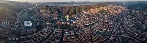 City District Prints: Aerial panoramic view of cityscape with residential buildings on sunny summer day in Basque Country