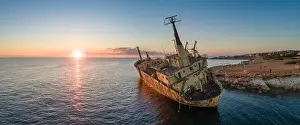 Cargo Ship Prints: Aerial panoramic view of the Edro III shipwreck at sunset - a cargo ship that ran aground in 2011 - Paphos