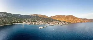 Residents Prints: Aerial panoramic view of Komiza village coastline on Vis Island in Croatia sunset hour