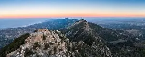 Aerial panoramic view of the mountaintop Buffavento Castle at sunset, Çatalköy, Northern Cyprus