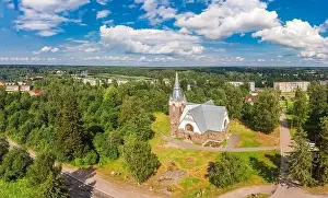 City Temple Prints: Aerial panoramic view to old lutheran church kirk Ryaysyalya designed by architect Joseph Stenback in style of Finnish