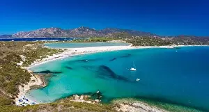Watchtower Prints: Aerial done panoramic view of Porto Giunco beach and tower in Villasimius, Sardinia, Italy