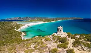 Watchtower Prints: Aerial done panoramic view of Porto Giunco beach and tower in Villasimius, Sardinia, Italy