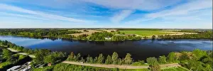 Top Tree Prints: Aerial panoramic view of river Kymijoki bank with beautiful wooden Rabbelugn Manor - Takamaan Kartano