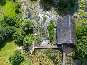 Aerial photo of Majerovo Vrilo, set of wooden mill houses on the source of Gacka river in the village of Sinac, Croatia