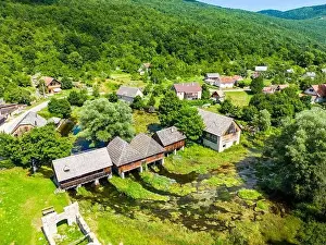 Aerial photo of Majerovo Vrilo, set of wooden mill houses on the source of Gacka river in the village of Sinac, Croatia