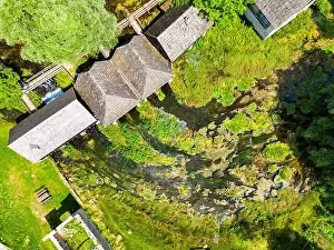Aerial photo of Majerovo Vrilo, set of wooden mill houses on the source of Gacka river in the village of Sinac, Croatia