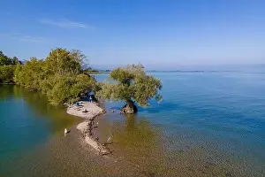 Aerial shot with a drone of the local recreation area at the Wocherhafen at the Lake Constance in Austria