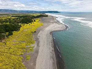 River Mouth Prints: Aerial shot of the point where the river Tolten flows into the pacific ocean in Araucania