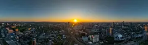 Urban Sprawl Prints: An aerial shot during sunset providing a sweeping view of Manchester including Deansgate