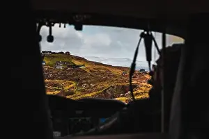 Explore Denmark Prints: Aerial shot of the town Torshavn taken from the inside of a helicopter during a flight over the Faroe Islands with