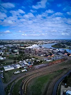 Queensland Prints: Aerial of the sugar cane trains hauling into Millaquin Sugar Mill