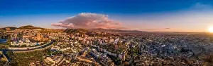 Aerial sunset panorama view of the Alhambra fortress and palace complex with surrounding medieval walls