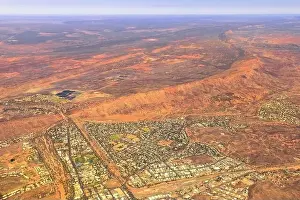 Central Australia Prints: Aerial view of Alice Springs city of Red Centre desert with Macdonnell ranges of Northern Territory in Central