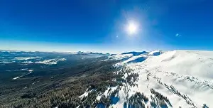 Mountain White Prints: Aerial view of an amazing mesmerizing view of a mountain winter landscape on a sunny frosty day at a ski resort