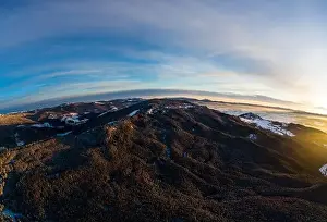 Hill Glacier Prints: Aerial view amazing view of the mountains and slopes covered with dense thickets of fir trees