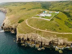 Dorset Coast Prints: Aerial view of Anvil Point Lighthouse on the Jurassic Coast in Dorset, south west England