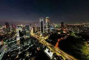 Jakarta Prints: Aerial view of Architecture details Modern Building Glass facade Business background at night