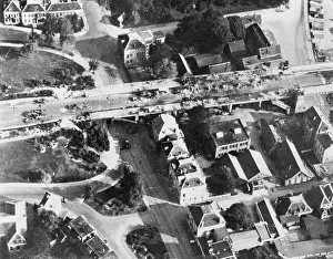 Aircrew Prints: An aerial view of the Arnhem bridge in Holland shows wrecked German vehicles at the north end following operations by