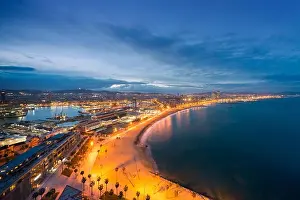 Aerial view of Barcelona Beach in summer night along seaside in Barcelona, Spain. Mediterranean Sea in Spain