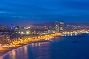 Aerial view of Barcelona Beach in summer night along seaside in Barcelona, Spain. Mediterranean Sea in Spain