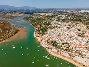 Coastal Area Prints: Aerial view, bay with yachts and view of coastal town Alvor, Algarve, Portugal