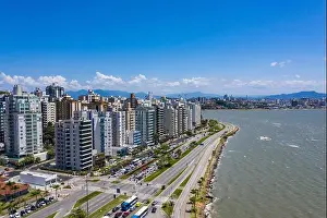 Aerial Photo Prints: Aerial view of beach promenade and high-rise residential buildings