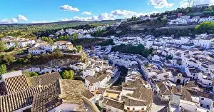 Pueblo Prints: Aerial view of a beautiful Andalusian village of white houses built on the mountainside